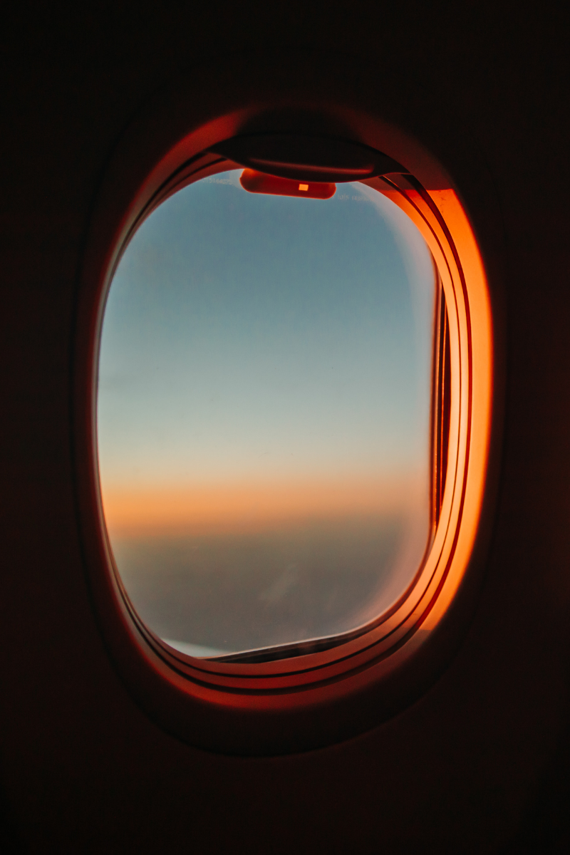 airplane window - best travel credit card